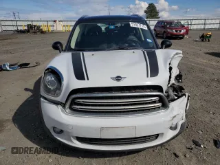 2015 MINI Countryman with VIN WMWZB3C50FWR44801, listed as a Copart auction lot 51957715 with 69,537 mi miles and Salvage Title. Bid and sale history available at DreamBid. Image 5.