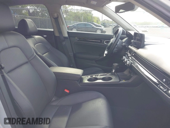 2023 Honda Civic Touring with VIN 2HGFE1F91PH305053, listed as a IAAI auction lot 42378311 with 41,576 mi miles and . Bid and sale history available at DreamBid. Image 5.