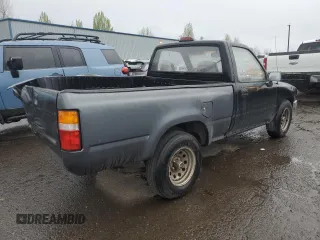 1995 Toyota Pickup with VIN JT4RN81AXS5201652, listed as a Copart auction lot 50661685 with 231,649 mi miles and Salvage title. Bid and sale history available at DreamBid. Image 3.