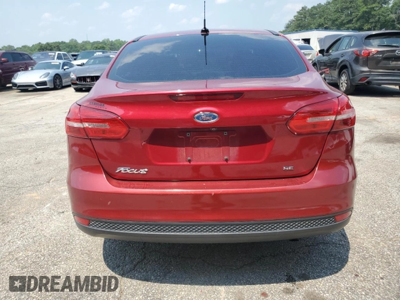 2017 Ford Focus SE with VIN 1FADP3F26HL327333, listed as a Copart auction lot 59206945 with 33,762 mi miles and Salvage title. Bid and sale history available at DreamBid. Image 6.