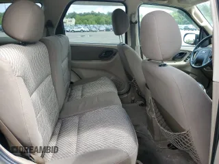 2004 Ford Escape XLT с VIN 1FMYU031X4KB34886, выставлен на аукционе Copart как лот 56212055 с пробегом 188 665 миль миль и Списание • Salvage title. История ставок и продаж доступна на DreamBid. Изображение 11.
