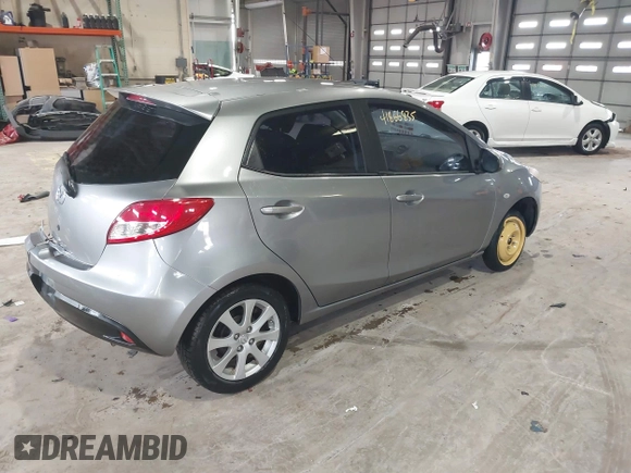 2012 Mazda 2 Touring with VIN JM1DE1LY8C0140439, listed as a IAAI auction lot 41866835 with 122,512 mi miles. Bid and sale history available at carsss.com. Image 4.