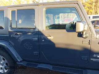 2017 Jeep Wrangler Unlimited Sahara with VIN 1C4BJWEGXHL686766, listed as a IAAI auction lot 41305319 with 97,806 mi miles. Bid and sale history available at carsss.com. Image 13.