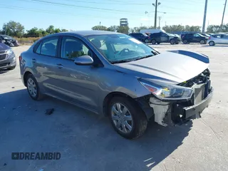 2023 Kia Rio S with VIN 3KPA24AD1PE619327, listed as a IAAI auction lot 41117218 with 36,007 mi miles. Bid and sale history available at carsss.com. Image 1.