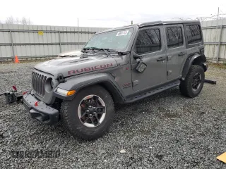 2018 Jeep Wrangler Unlimited Rubicon with VIN 1C4HJXFNXJW196460, listed as a Copart auction lot 49681715 with 71,187 mi miles and Salvage title. Bid and sale history available at DreamBid. Image 1.