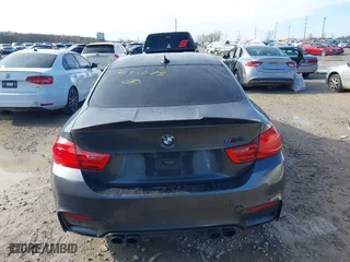 2015 BMW M4 with VIN WBS3R9C57FK334921, listed as a IAAI auction lot 41869773 with 107,058 mi miles. Bid and sale history available at carsss.com. Image 16.