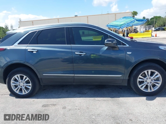 2020 Cadillac XT5 Luxury FWD z VIN 1GYKNAR45LZ224459, wystawiony jako IAAI lot #42295055 z przebiegiem 69 751 mil mil oraz . Historia ofert i sprzedaży dostępna na DreamBid. Obrazek 13.