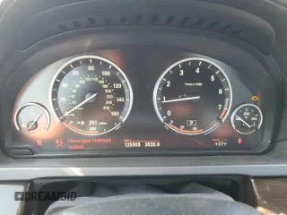 2011 BMW 7 Series 750i with VIN WBAKA8C58BCY37346, listed as a Copart auction lot 65017655 with 125,505 mi miles and Salvage title. Bid and sale history available at DreamBid. Image 9.