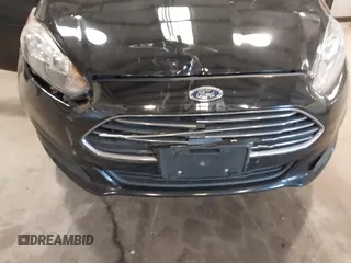 2018 Ford Fiesta SE z VIN 3FADP4BJ3JM141658, wystawiony jako IAAI lot #41737201 z przebiegiem 92 078 mil mil oraz . Historia ofert i sprzedaży dostępna na DreamBid. Obrazek 6.