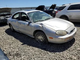 1996 Mercury Sable LS z VIN 1MELM53S4TG634577, wystawiony jako Copart lot #61707733 z przebiegiem 76 781 mil mil oraz Szkoda całkowita • Salvage title. Historia ofert i sprzedaży dostępna na DreamBid. Obrazek 4.