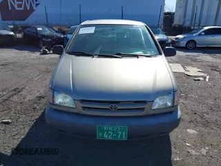 2000 Toyota Sienna CE with VIN 4T3ZF19C1YU240674, listed as a IAAI auction lot 41934876 with 250,196 mi miles. Bid and sale history available at carsss.com. Image 13.