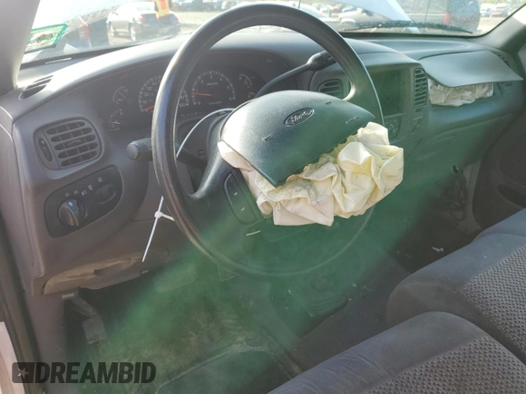 2000 Ford F-150 XL with VIN 2FTRX18L2YCA44464, listed as a Copart auction lot 51081335 with Not provided miles and Salvage title. Bid and sale history available at DreamBid. Image 8.