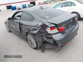 2014 BMW 4 Series 435i xDrive with VIN WBA3R5C53EK188805, listed as a IAAI auction lot 42365884 with 148,294 mi miles and . Bid and sale history available at DreamBid. Image 3.