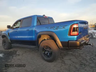 2021 Ram 1500 TRX with VIN 1C6SRFU98MN757772, listed as a Copart auction lot 49923465 with 27,250 mi miles and Salvage Title. Bid and sale history available at carsss.com. Image 2.