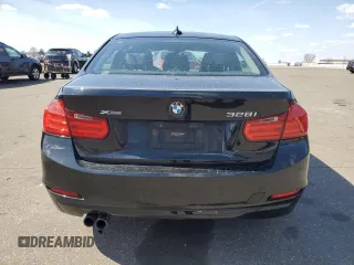 2014 BMW 3 Series 328i xDrive with VIN WBA3B3C58EJ977546, listed as a Copart auction lot 53090185 with 134,823 mi miles and Salvage Title. Bid and sale history available at DreamBid. Image 6.