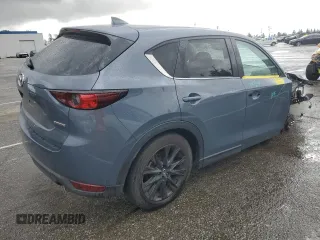 2021 Mazda CX-5 Touring with VIN JM3KFACM3M0420425, listed as a Copart auction lot 47993745 with 56,184 mi miles and Salvage Title. Bid and sale history available at carsss.com. Image 3.