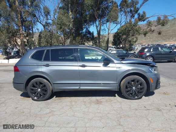 2021 Volkswagen Tiguan SE with VIN 3VV3B7AX9MM007822, listed as a IAAI auction lot 41637123 with 68,784 mi miles. Bid and sale history available at carsss.com. Image 14.