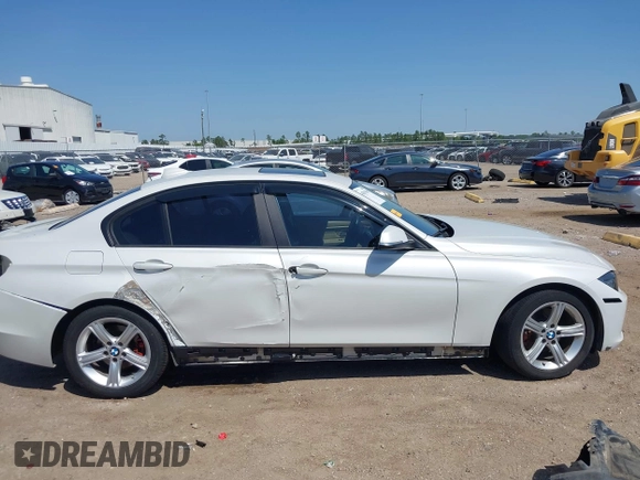 2012 BMW 3 Series 328i with VIN WBA3A5C51CF349987, listed as a IAAI auction lot 42013599 with 256,461 mi miles. Bid and sale history available at carsss.com. Image 13.