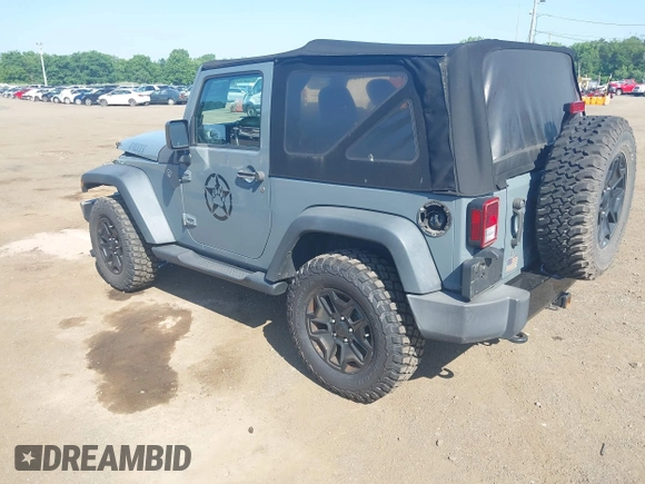 2015 Jeep Wrangler Freedom Edition with VIN 1C4AJWAG1FL714002, listed as a IAAI auction lot 42579024 with 98,732 mi miles and . Bid and sale history available at DreamBid. Image 3.