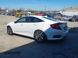 2018 Honda Civic EX with VIN 2HGFC2F75JH511025, listed as a IAAI auction lot 41768733 with 56,707 mi miles and . Bid and sale history available at DreamBid. Image 3.