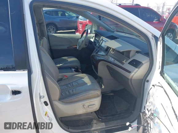 2011 Toyota Sienna XLE with VIN 5TDDK3DC4BS013416, listed as a IAAI auction lot 41933299 with 170,479 mi miles and . Bid and sale history available at DreamBid. Image 5.