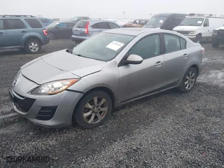 2010 Mazda Mazda3 i Touring with VIN JM1BL1SG0A1224493, listed as a IAAI auction lot 41730144 with 208,950 mi miles. Bid and sale history available at carsss.com. Image 2.