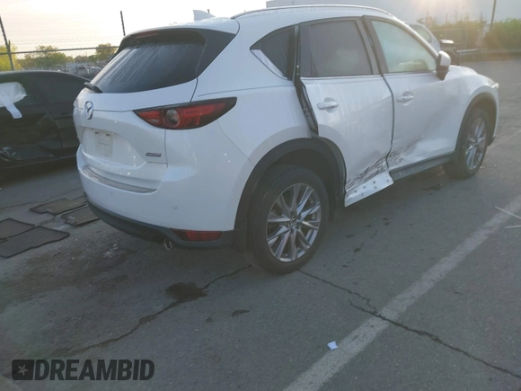 2019 Mazda CX-5 Grand Touring with VIN JM3KFADM2K0684232, listed as a IAAI auction lot 41929139 with 31,836 mi miles. Bid and sale history available at carsss.com. Image 4.