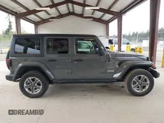 2019 Jeep Wrangler Unlimited Sahara with VIN 1C4HJXEN0KW540591, listed as a IAAI auction lot 42076235 with 41,016 mi miles and . Bid and sale history available at DreamBid. Image 14.