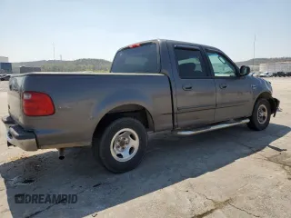 2003 Ford F-150 XLT with VIN 1FTRW07663KA63497, listed as a Copart auction lot 51658115 with 269,633 mi miles and Salvage Title. Bid and sale history available at carsss.com. Image 3.