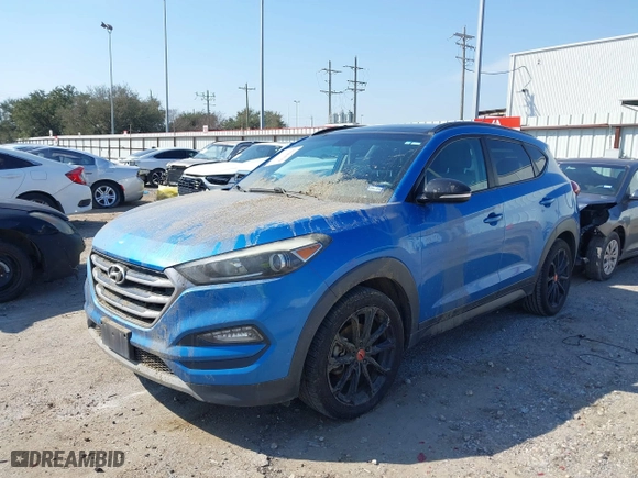2017 Hyundai Tucson Value with VIN KM8J33A2XHU467861, listed as a IAAI auction lot 41684522 with 96,841 mi miles. Bid and sale history available at carsss.com. Image 2.