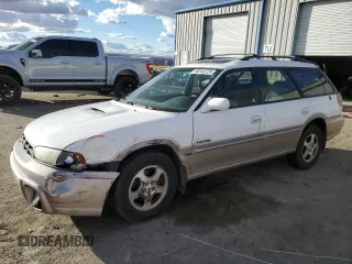 1999 Subaru Legacy Outback with VIN 4S3BG6857X7659668, listed as a Copart auction lot 48240725 with 140,132 mi miles and Salvage title. Bid and sale history available at DreamBid. Image 1.