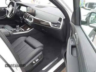 2021 BMW X5 xDrive40i with VIN 5UXCR6C03M9G36156, listed as a IAAI auction lot 42125009 with 30,877 mi miles. Bid and sale history available at carsss.com. Image 5.