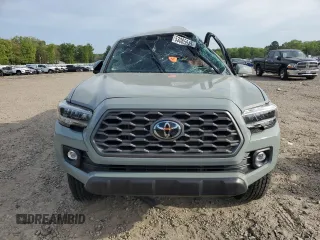 2023 Toyota Tacoma SR z VIN 3TMCZ5ANXPM622882, wystawiony jako Copart lot #53085845 z przebiegiem 11 207 mil mil oraz Szkoda całkowita • Salvage title. Historia ofert i sprzedaży dostępna na DreamBid. Obrazek 5.