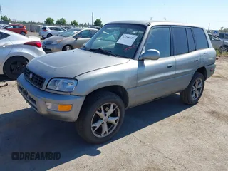 1999 Toyota RAV4 with VIN JT3GP10V4X7055360, listed as a IAAI auction lot 42718612 with 238,904 mi miles and . Bid and sale history available at DreamBid. Image 2.