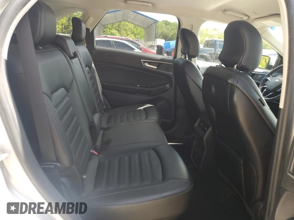 2019 Ford Edge SEL z VIN 2FMPK3J95KBB19621, wystawiony jako Copart lot #56135855 z przebiegiem 67 961 mil mil oraz Szkoda całkowita • Salvage title. Historia ofert i sprzedaży dostępna na DreamBid. Obrazek 11.