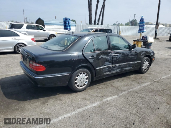 2002 Mercedes-Benz E-Class with VIN WDBJF82JX2X064384, listed as a Copart auction lot 53058325 with 188,440 mi miles and Salvage Title. Bid and sale history available at carsss.com. Image 3.