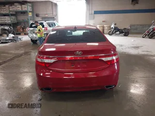 2012 Hyundai Azera z VIN KMHFG4JG7CA183643, wystawiony jako IAAI lot #42503232 z przebiegiem 180 485 mil mil oraz . Historia ofert i sprzedaży dostępna na DreamBid. Obrazek 16.