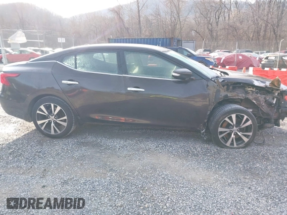2016 Nissan Maxima SL z VIN 1N4AA6AP9GC385718, wystawiony jako IAAI lot #41099349 z przebiegiem 108 841 mil mil oraz . Historia ofert i sprzedaży dostępna na DreamBid. Obrazek 13.