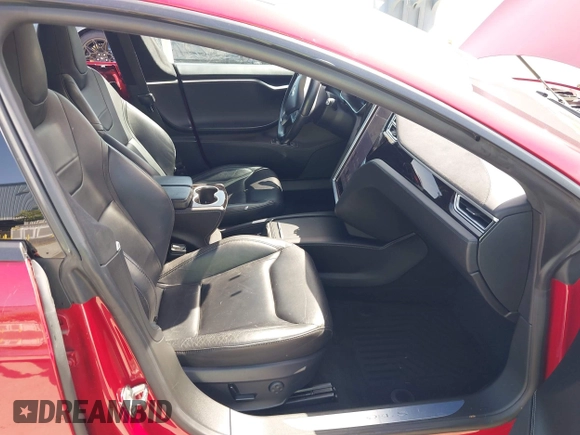 2016 Tesla Model S 70 with VIN 5YJSA1E17GF152401, listed as a IAAI auction lot 42272384 with 65,698 mi miles and . Bid and sale history available at DreamBid. Image 5.