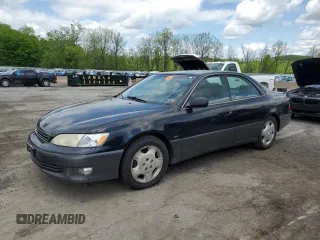 2000 Lexus ES 300 with VIN JT8BF28GXY5102018, listed as a Copart auction lot 56132805 with 154,854 mi miles and Clean title. Bid and sale history available at DreamBid. Image 1.