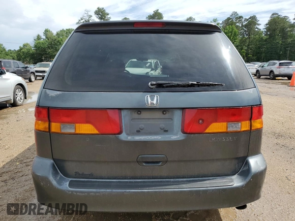 2003 Honda Odyssey EX-L with VIN 5FNRL18933B116127, listed as a Copart auction lot 56013645 with 157,118 mi miles and Salvage Title. Bid and sale history available at DreamBid. Image 6.