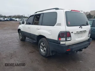 2002 Toyota Land Cruiser with VIN JTEHT05J822023282, listed as a IAAI auction lot 41474924 with 261,331 mi miles. Bid and sale history available at carsss.com. Image 3.