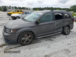 2015 Dodge Journey Crossroad with VIN 3C4PDCGB1FT670227, listed as a Copart auction lot 60516955 with 149,705 mi miles and Salvage title. Bid and sale history available at DreamBid. Image 1.