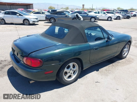 1999 Mazda MX-5 Miata with VIN JM1NB3530X0103644, listed as a IAAI auction lot 42524948 with Not provided miles and . Bid and sale history available at DreamBid. Image 4.