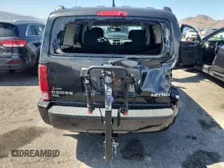 2011 Dodge Nitro Heat z VIN 1D4PT4GX6BW506192, wystawiony jako Copart lot #58795955 z przebiegiem 231 377 mil mil oraz Szkoda całkowita • Salvage title. Historia ofert i sprzedaży dostępna na DreamBid. Obrazek 6.