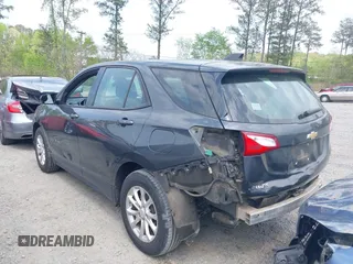 2018 Chevrolet Equinox LS with VIN 2GNAXHEV7J6147483, listed as a IAAI auction lot 42012811 with 180,478 mi miles and . Bid and sale history available at DreamBid. Image 14.