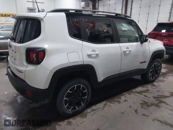 2023 Jeep Renegade Trailhawk with VIN ZACNJDC16PPP37073, listed as a IAAI auction lot 41181339 with 10,395 mi miles and . Bid and sale history available at DreamBid. Image 4.