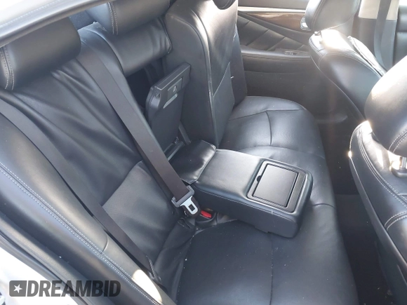 2015 Infiniti Q50 z VIN JN1BV7AP4FM341453, wystawiony jako IAAI lot #41755534 z przebiegiem Nie podano mil oraz . Historia ofert i sprzedaży dostępna na DreamBid. Obrazek 19.