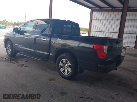 2018 Nissan Titan SV with VIN 1N6AA1E63JN512230, listed as a IAAI auction lot 42000705 with 64,479 mi miles and . Bid and sale history available at DreamBid. Image 3.