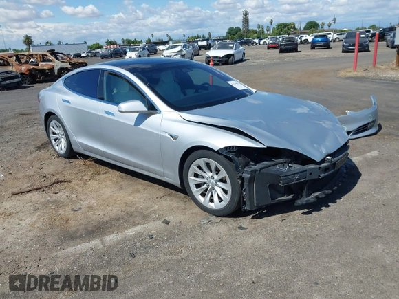 2016 Tesla Model S 90D with VIN 5YJSA1E22GF174637, listed as a IAAI auction lot 42234083 with 142,915 mi miles and . Bid and sale history available at DreamBid. Image 1.